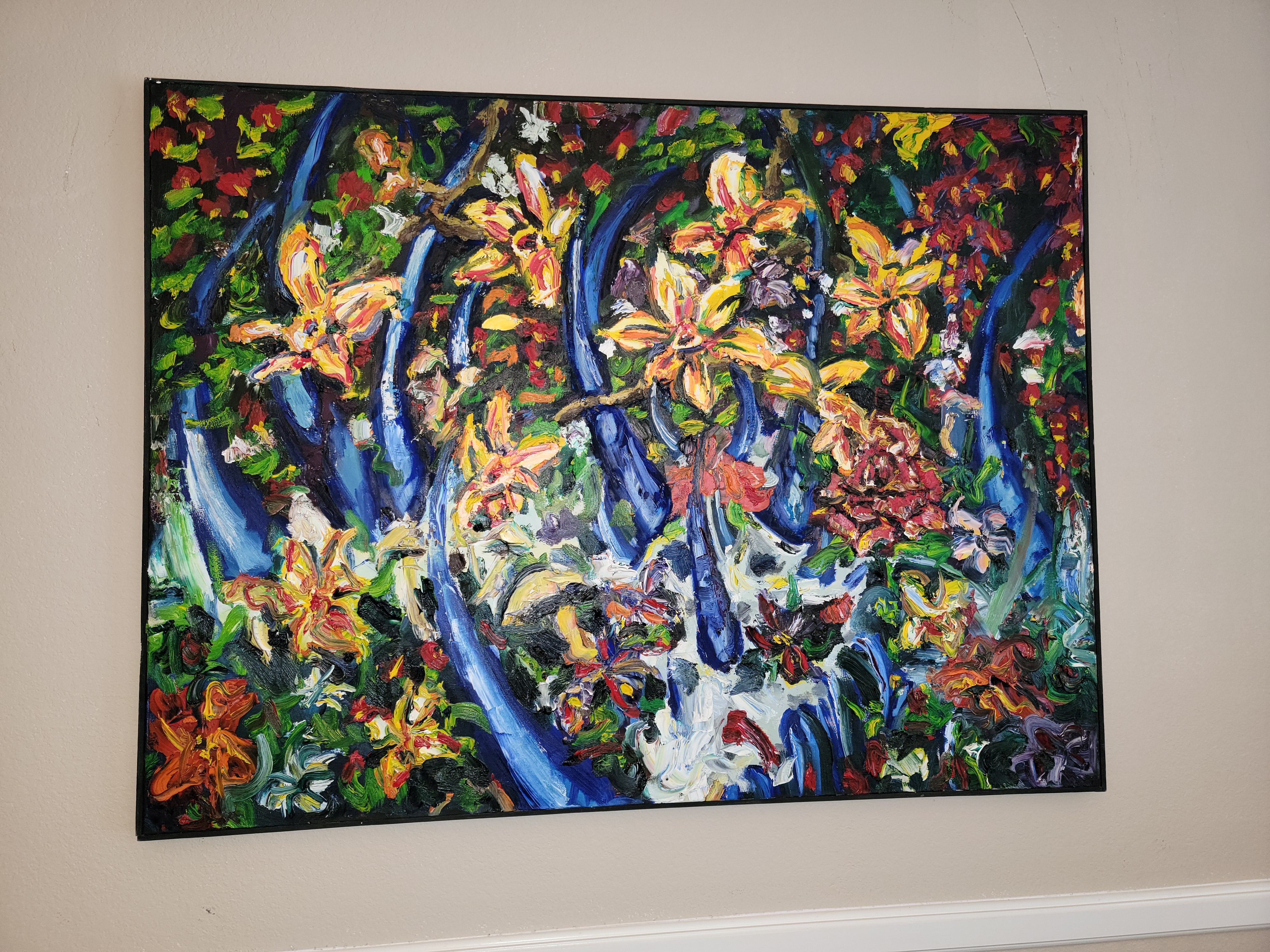 Vibrant abstract expressionist painting of blooming yellow and coral wildflowers against cobalt blue stalks in a slim black frame